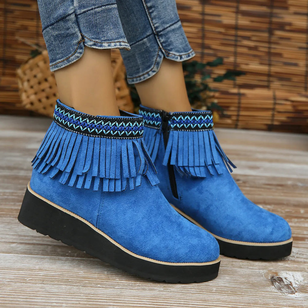 Women's suede wedge ankle boots in dark brown with a side zipper and thick rubber sole.