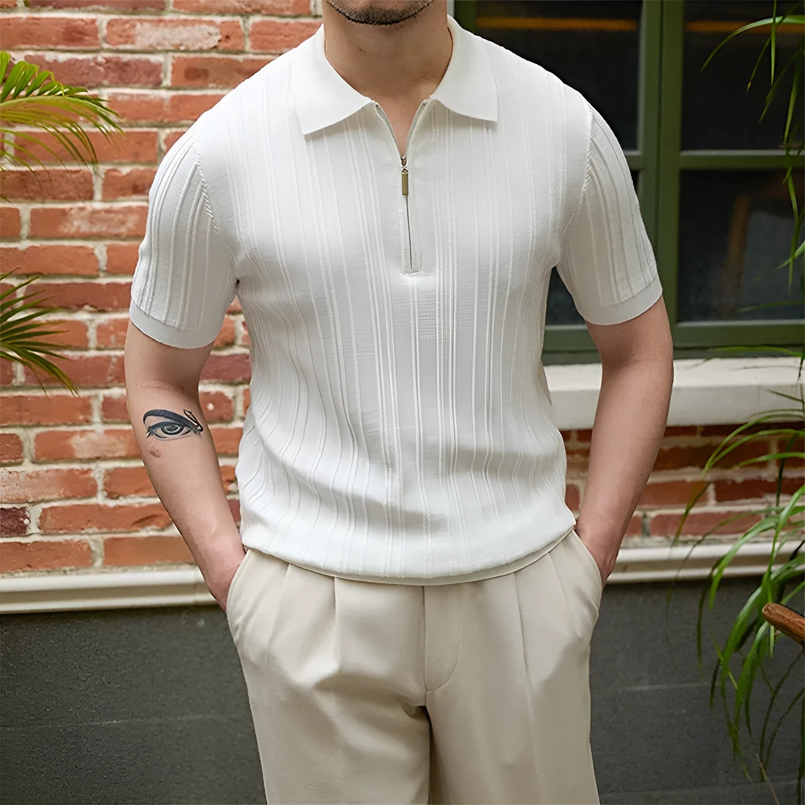 Short sleeve slim fit sunken stripe knitwear top in 100% lyocell, available in black and white, sizes M to 3XL