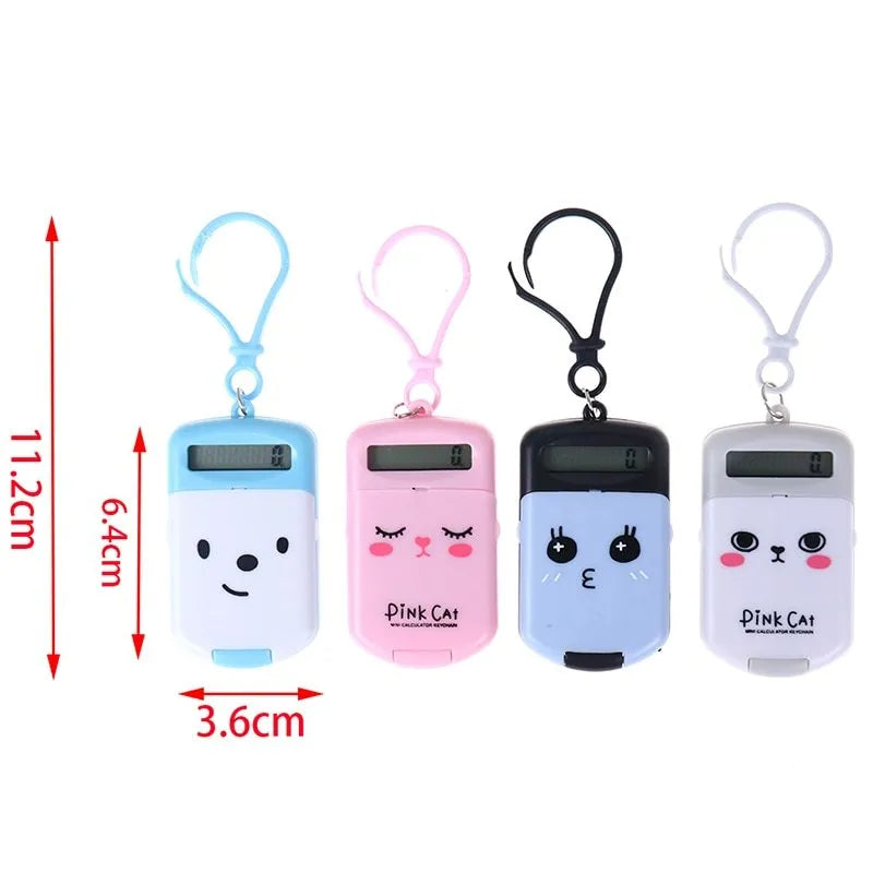 Cookie-shaped mini calculator with key ring in pink, blue, grey, or black, 6.4 x 3.6 x 11.2 cm plastic body