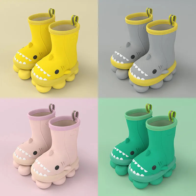 Shark and dinosaur design children's rain boots in green, available in multiple colours and sizes.