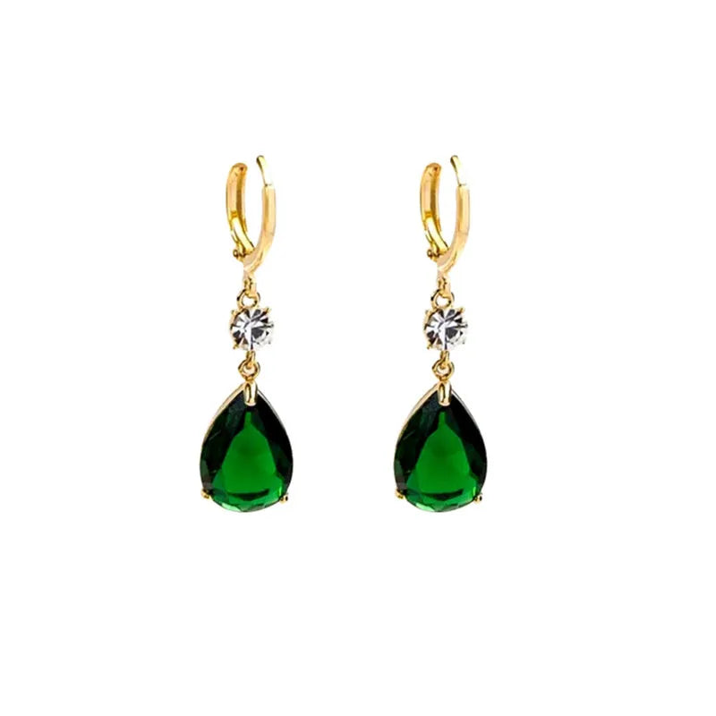 A pair of geometric teardrop-shaped earrings in emerald green colour.