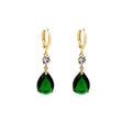 A pair of geometric teardrop-shaped earrings in emerald green colour.