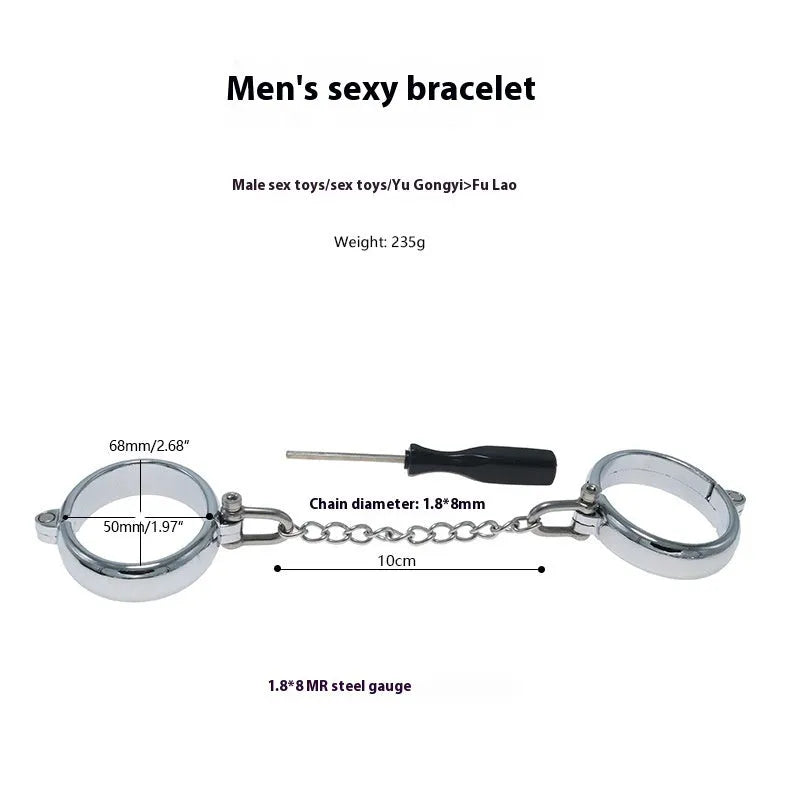 Silver zinc alloy handcuffs and footcuffs set for adults on a dark background