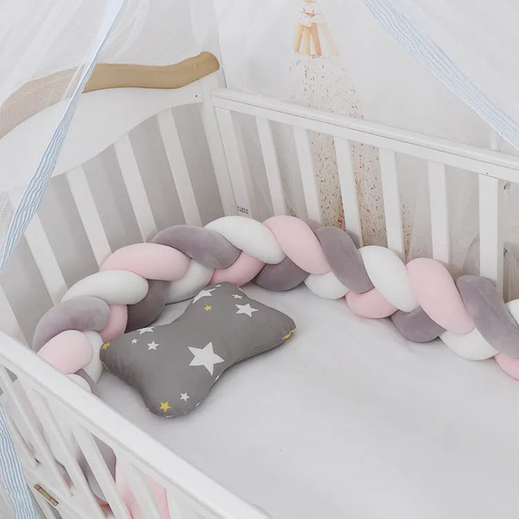 Flexible braided knot baby cot bumper in spandex crystal velvet fabric showing multiple colour options