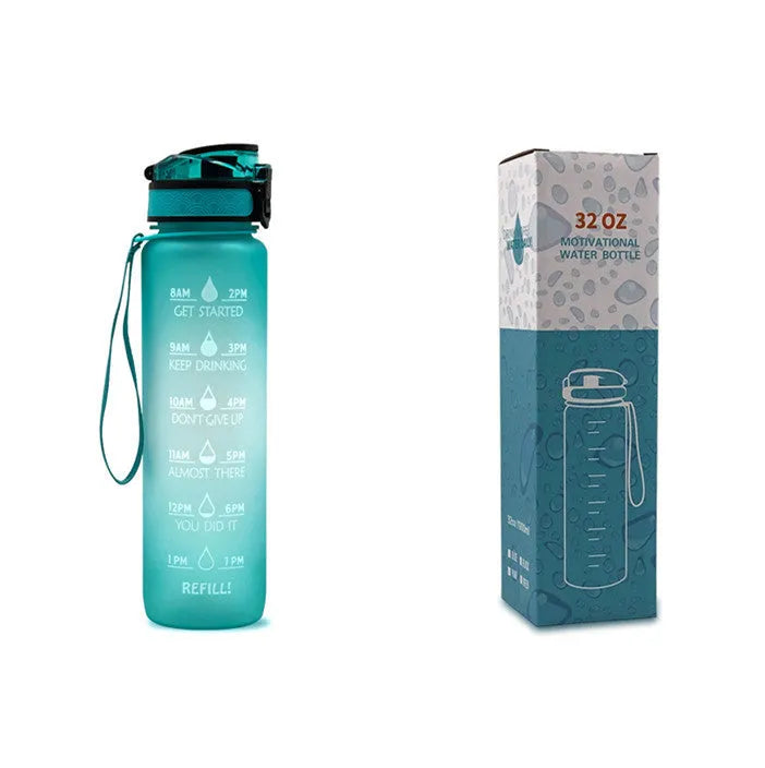 Blue-red gradient 1L Tritan water bottle with time markers and flip-top lid on a gym bag