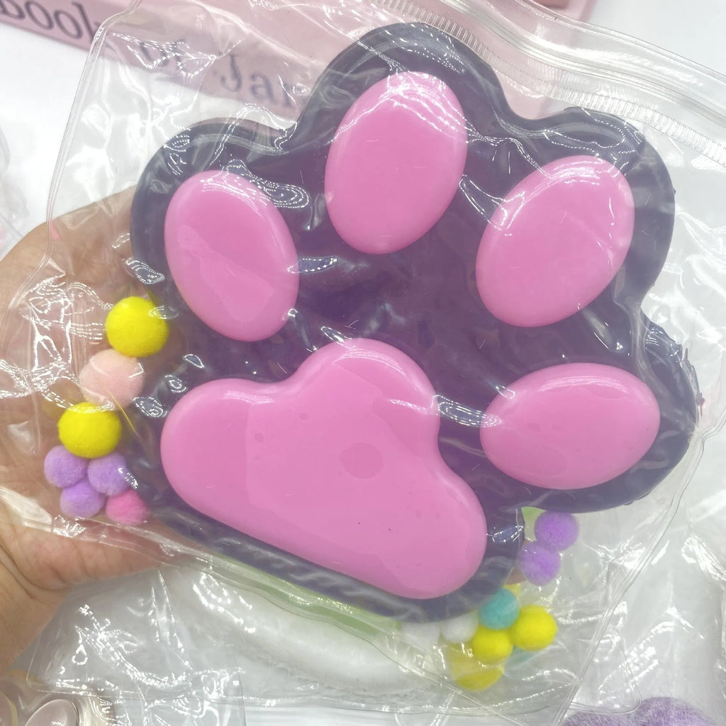 Oversized plush cat paw squeezing toy in 14CM flocking, TPR material, available in various colours for stress relief