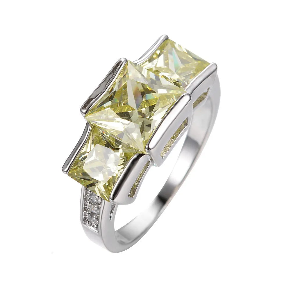 Colourful electroplated copper women's ring in a simple geometric design, showing multiple colour options.