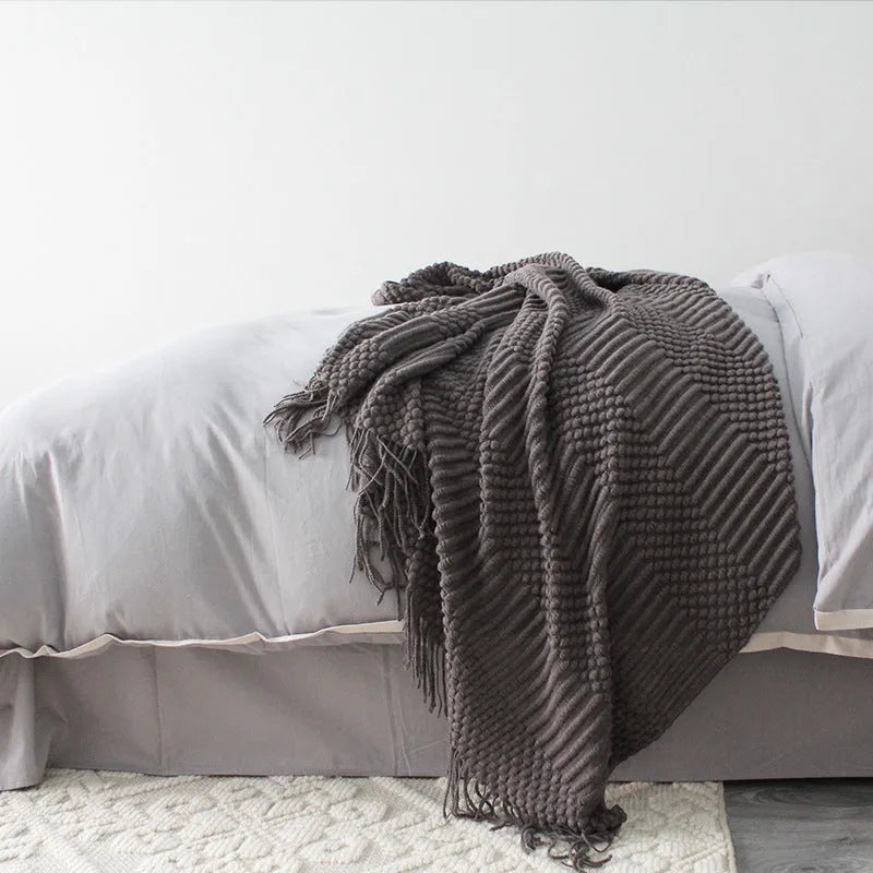 Polyester fleece nap blanket in dark grey, khaki, or light grey, measuring 127 by 170 centimetres.