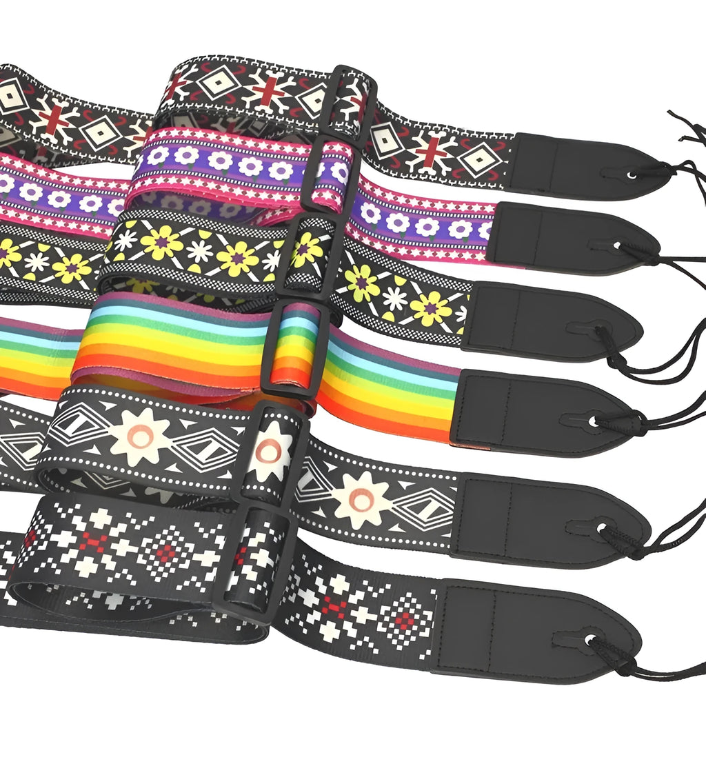 Printed cloth guitar shoulder strap showing eight design options on adjustable strap