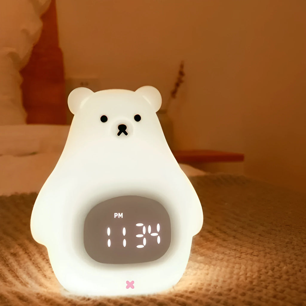 Big White Bear shaped silicone night light with remote control on a wooden bedside table