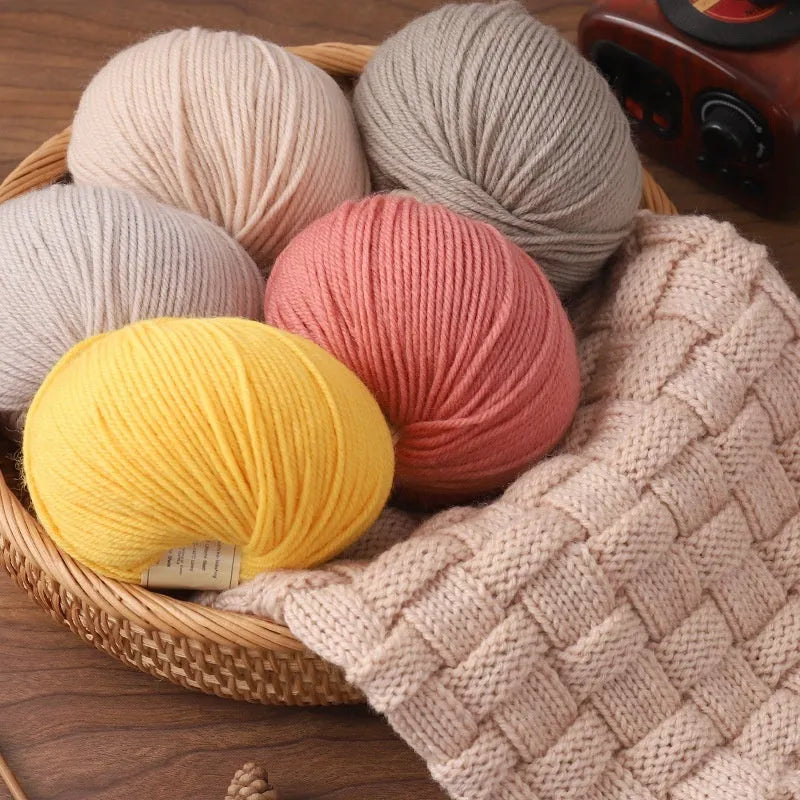 Skein of domestic wool knitting yarn for baby clothes in assorted colours.