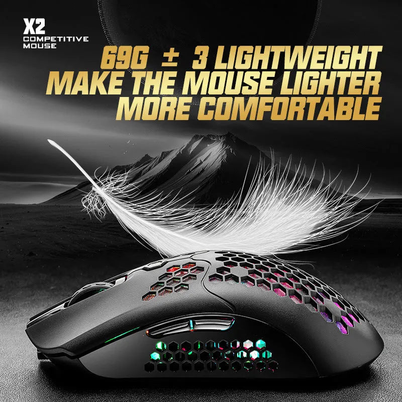 Free Wolf X2 wireless gaming mouse in black on a desk, showing RGB lighting, side buttons, and USB-C charging port.
