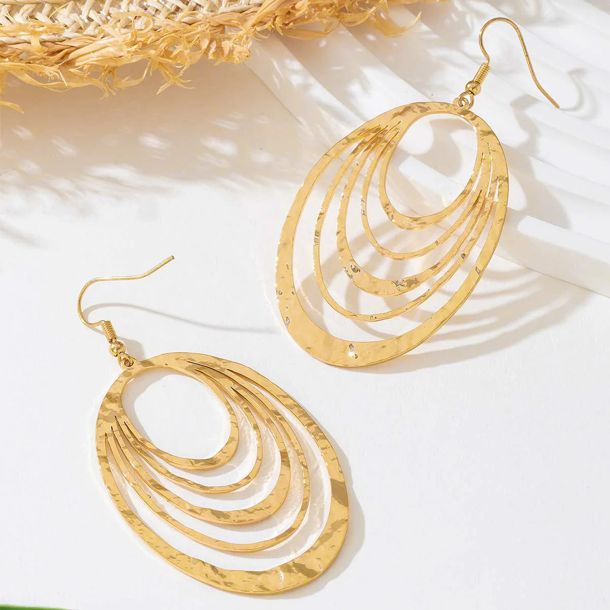 3 layer hollow oval gold dangle earrings with alloy and stainless steel construction