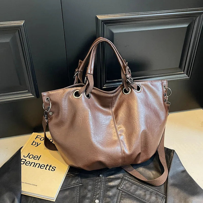 Solid colour women's PU tote bag with one shoulder strap and internal zipper pocket