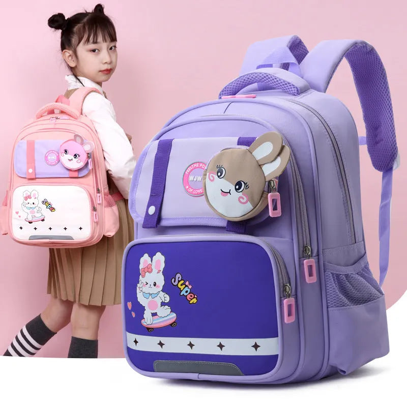 Spine protection schoolbag in dark blue with dinosaur print and air pillow belt