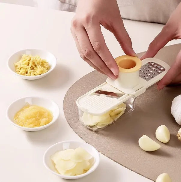 Three-in-one stainless steel ginger and garlic grinder with potato slicer, beige or green handle