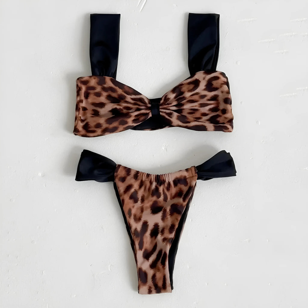 Leopard print women's bikini set showing sleeveless tube top and T-pants on a mannequin.