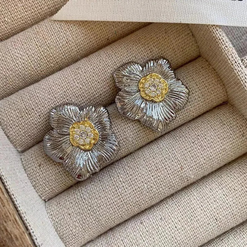 Retro textured gardenia stud earrings with two-tone electroplated finish on copper construction