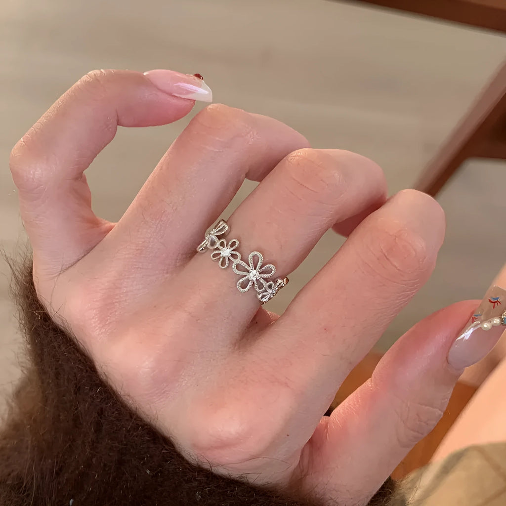 Silver Flowers lace hollow flower ring for women, electroplated metal geometric floral design