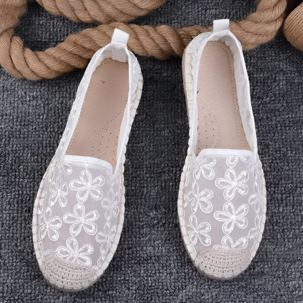 Women's flat linen fisherman shoes in white with a round toe and rubber sole.