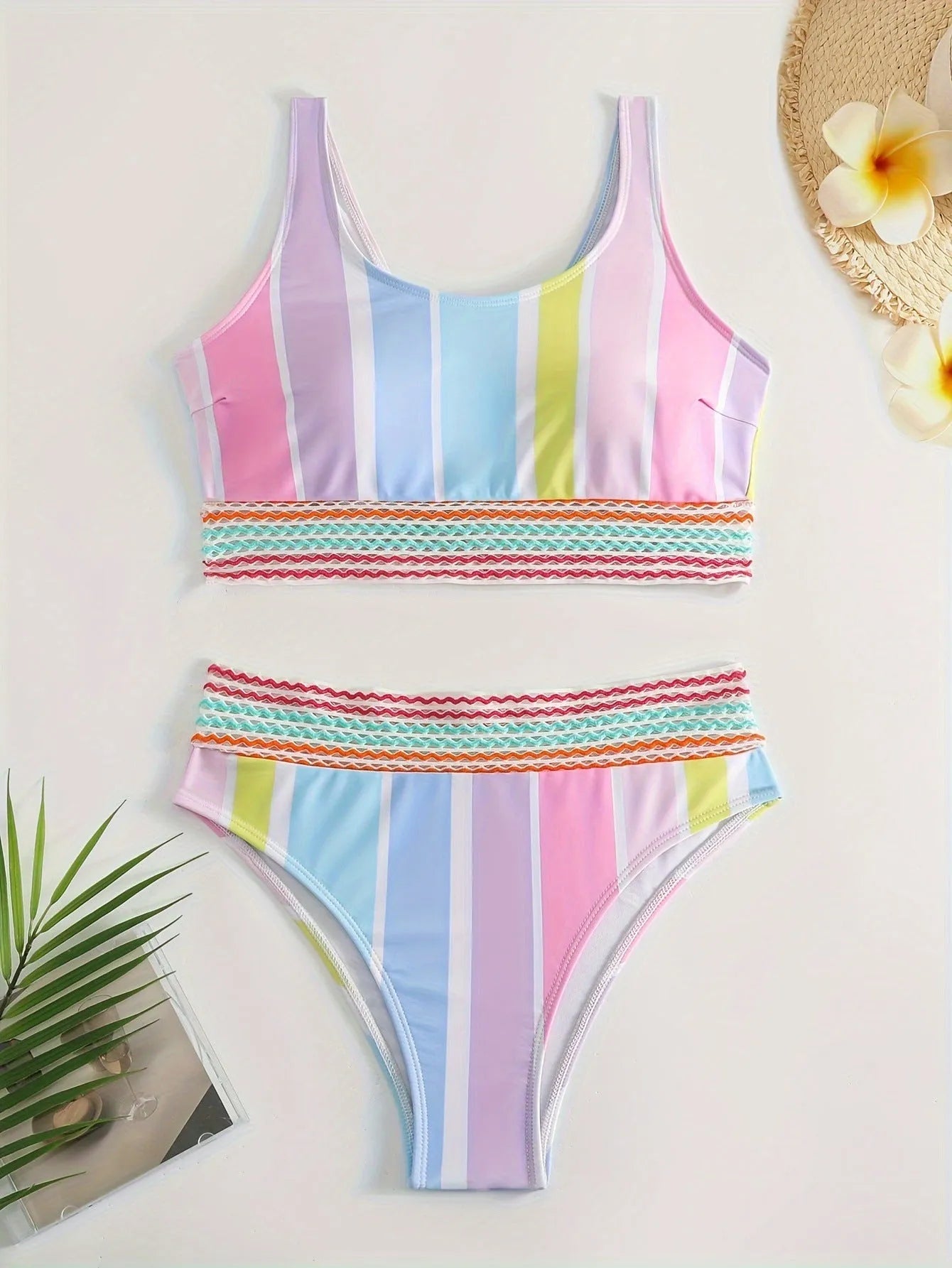 Women's striped sports bikini top and briefs on a mannequin, showing the European and American style pattern.
