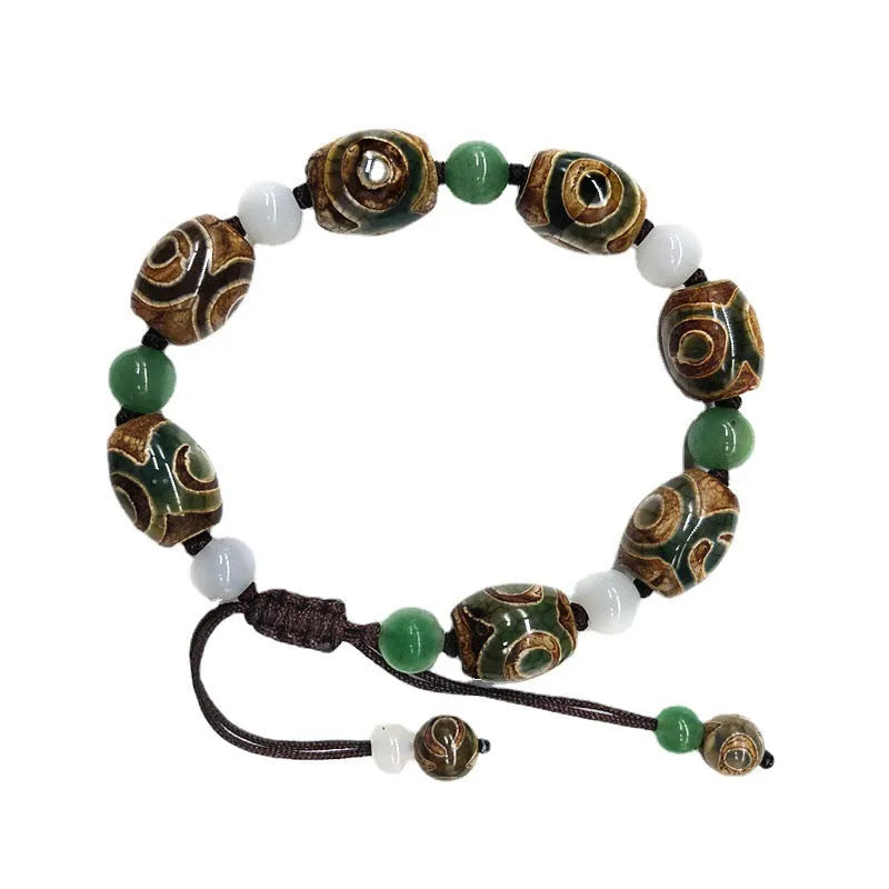 Green agate Tibetan bracelet with hand-woven three-eye geometric pattern