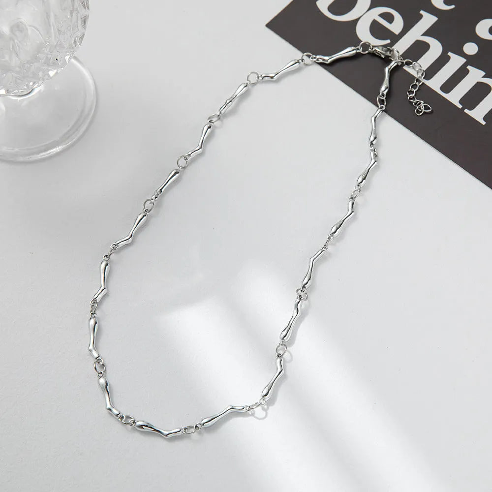 Thorn clavicle chain cold style necklace with titanium steel geometric pendant on 42cm alloy chain, electroplated finish