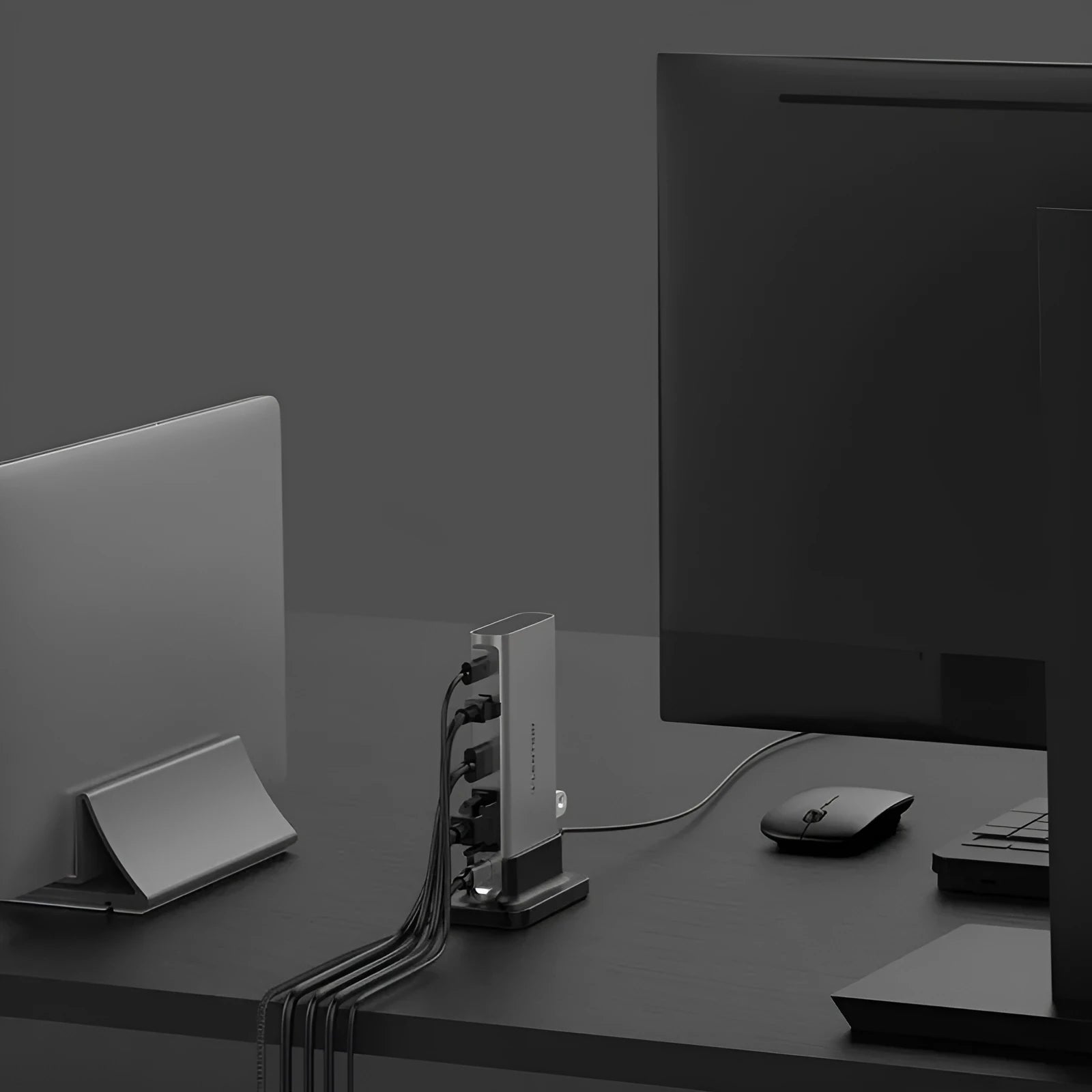 Plastic 11-in-1 USB-C docking station in deep space grey with multiple ports including HDMI, VGA, USB, and Ethernet