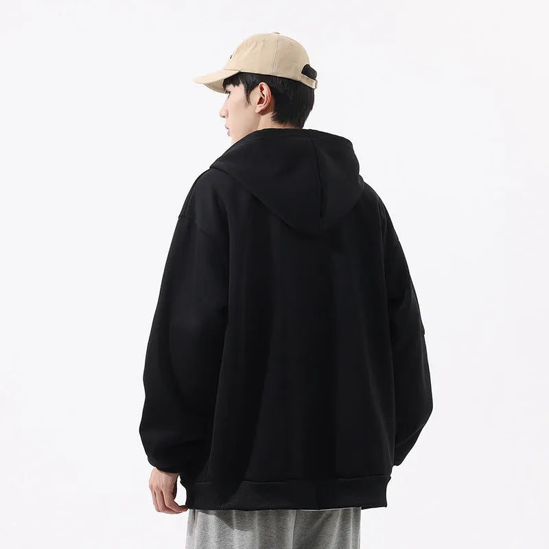 Loose hooded cardigan for teenagers in solid black, unlined polyester fibre, relaxed fit, front view