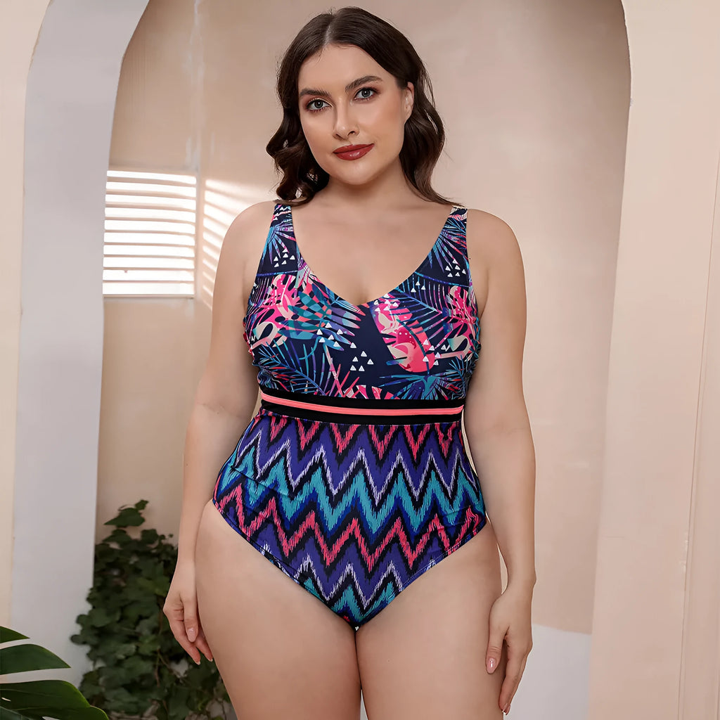 Women's blue printed one-piece swimsuit with spaghetti straps on a mannequin.