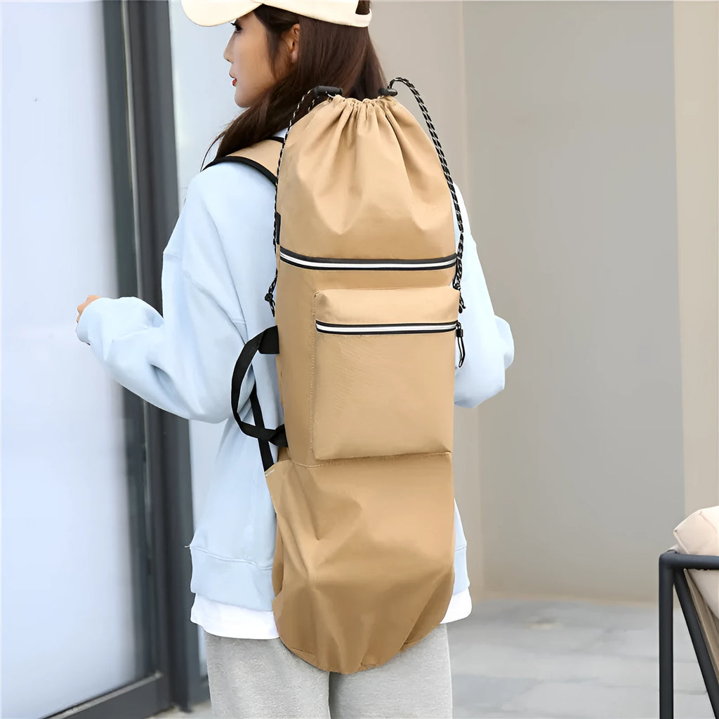 Black waterproof nylon bag for carrying a skateboard and fishing rods on a shoulder strap.