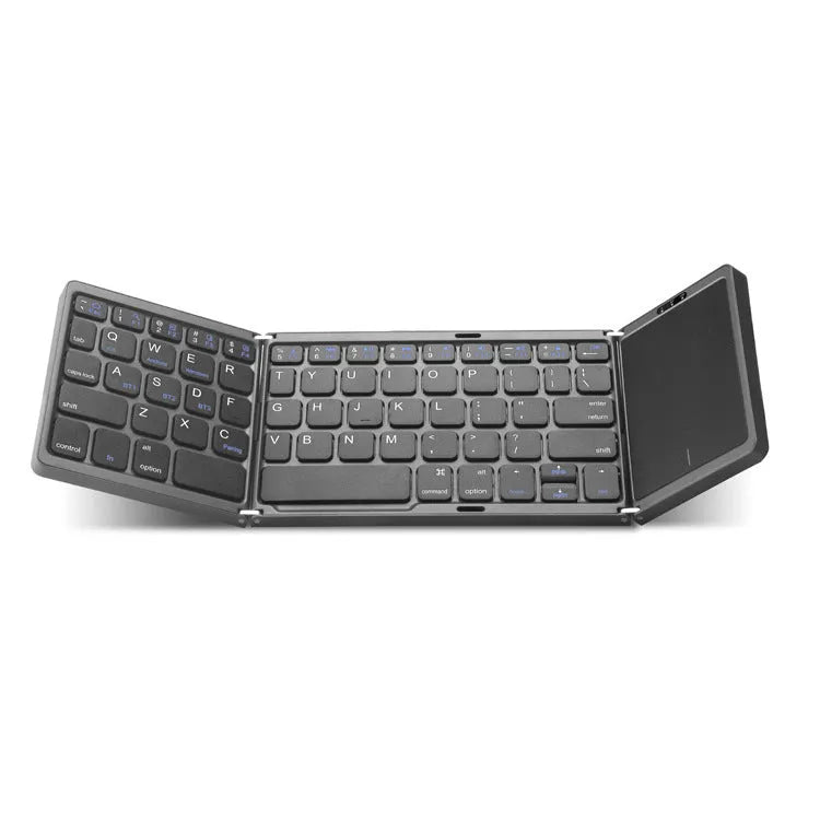 Three folding wireless Bluetooth keyboard with touch pad in black, unfolded on a desk