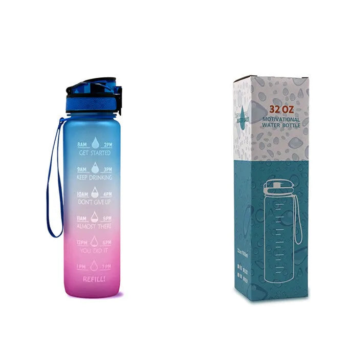 Blue-red gradient 1L Tritan water bottle with time markers and flip-top lid on a gym bag