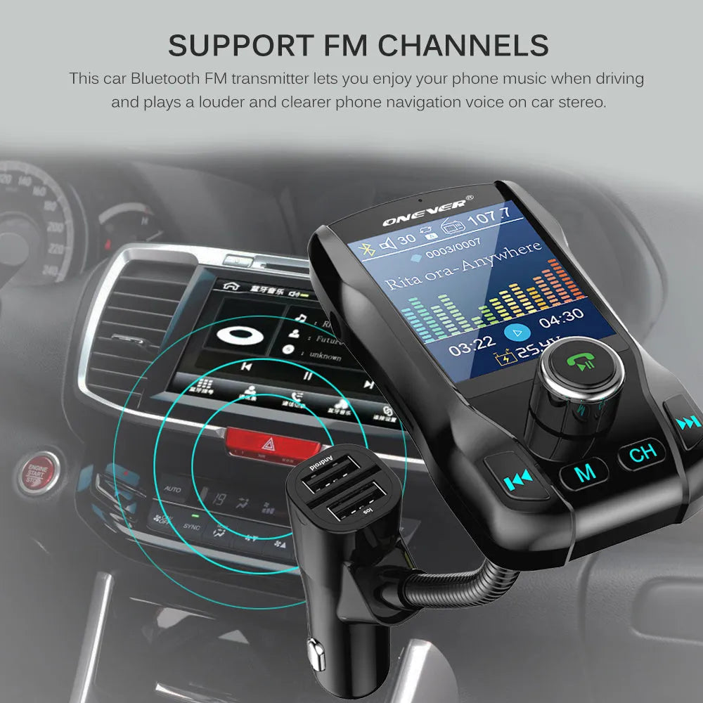 Black car FM transmitter with colour screen and dual USB ports plugged into a car dashboard