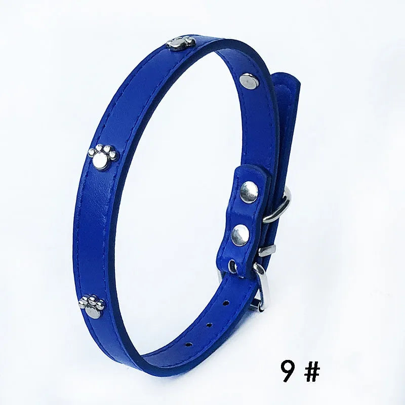 Pack of 10 1.5cm PU dog collars in various colours with bell pendant