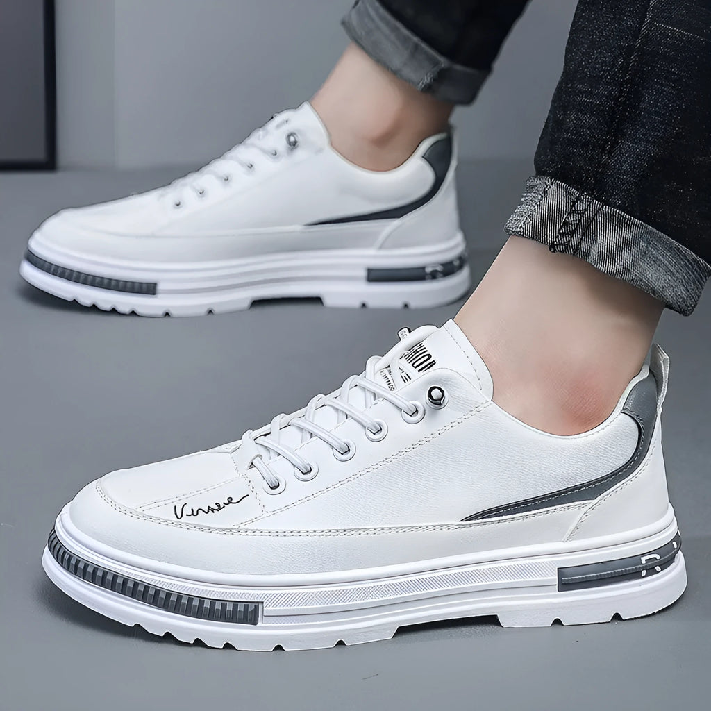Men's black and white Korean-style low-top platform sneakers with elastic band closure and round toe.