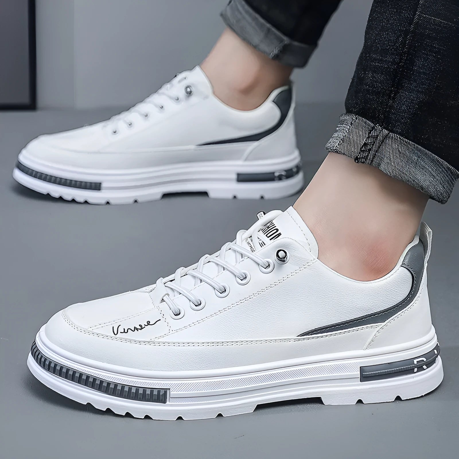 Men's black and white Korean-style low-top platform sneakers with elastic band closure and round toe.