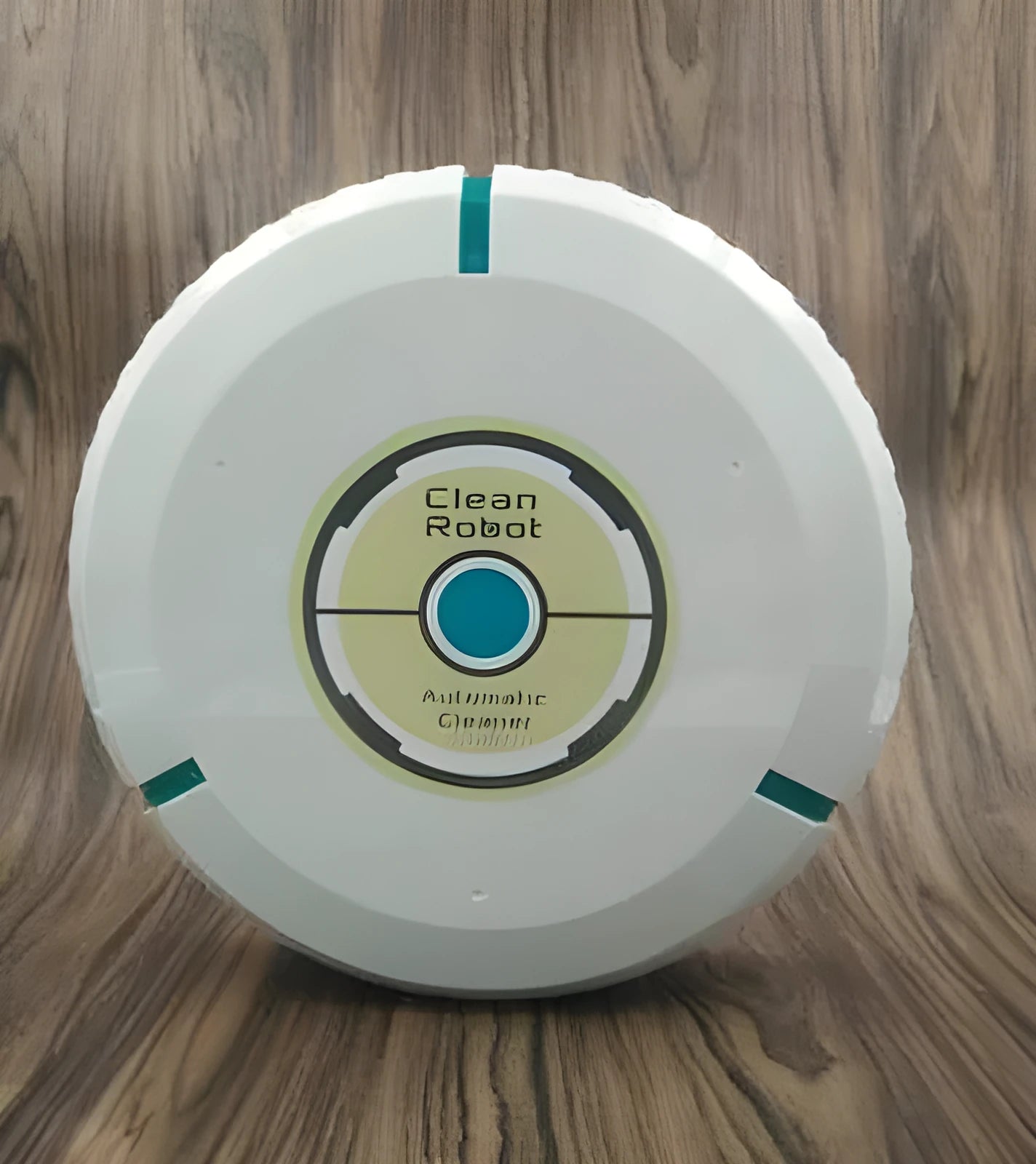 Black and white automatic robot vacuum cleaner on a wooden floor.