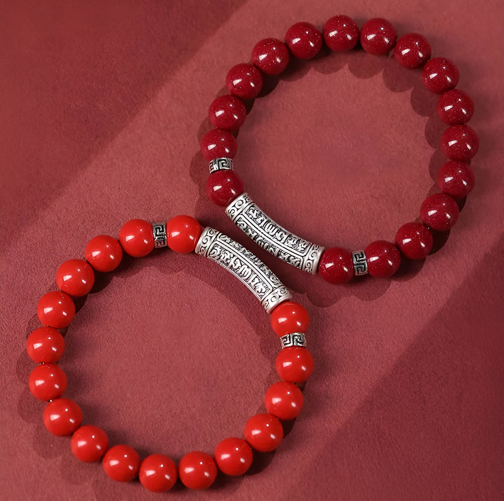Handmade cinnabar bracelet with purple gold sand beads in a unisex national style design.