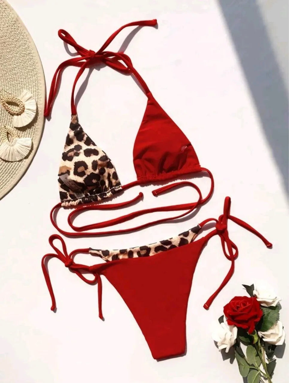 Women's leopard print bikini swimsuit with halter neck and split front design
