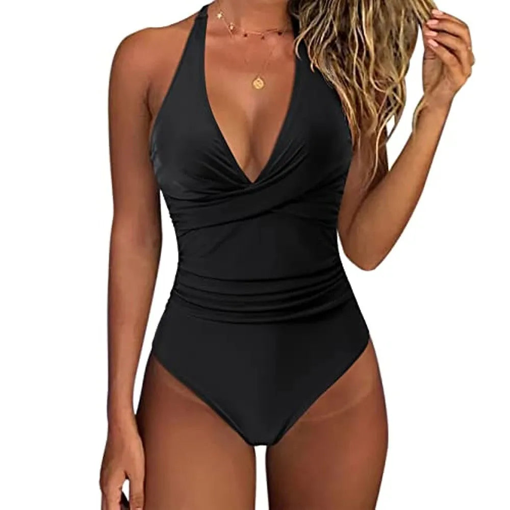 Women's solid colour cross-front one-piece swimsuit in polyester on a mannequin.