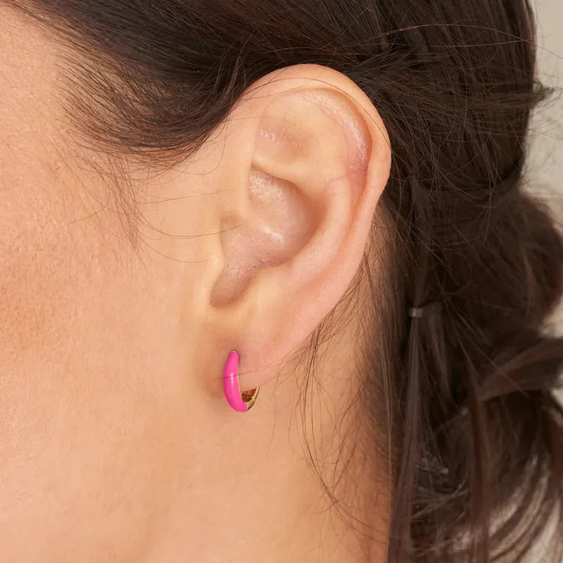 A pair of U-shaped geometric earrings with a glossy oval centre, in a choice of seven epoxy resin colours.