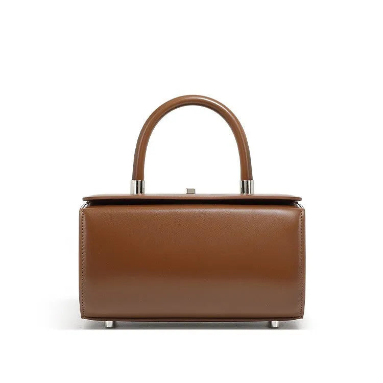 Women's leather crossbody bag in clamshell design with internal phone and document organisers