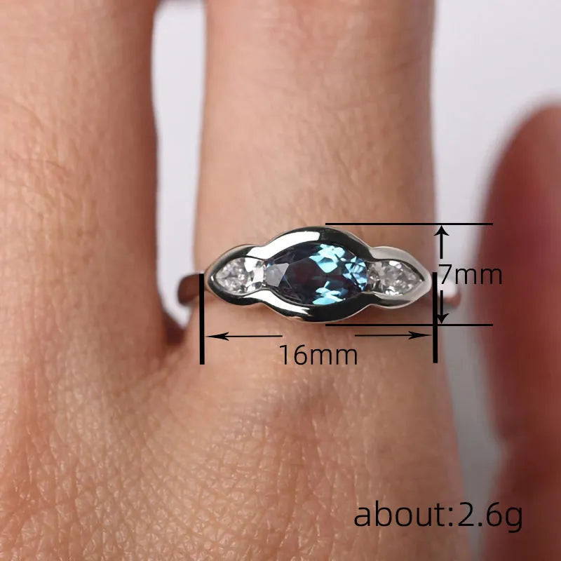 Geometric ellipse women's ring with white gold plating and inlaid zircon stones