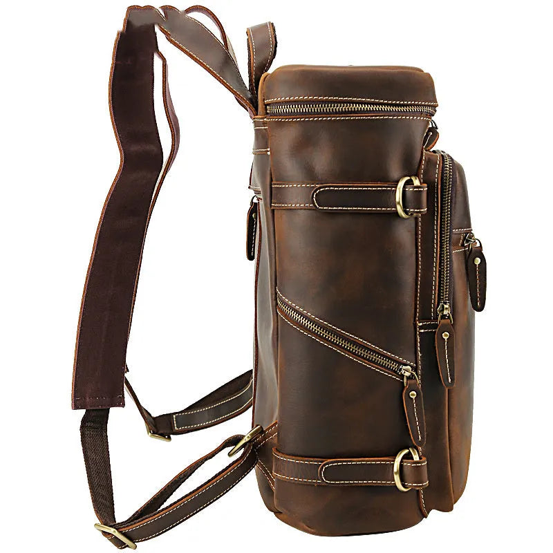Large brown leather backpack with zipper closure, under 20L capacity