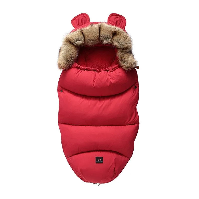 Silkworm cocoon style baby stroller sleeping bag in cotton blend fabric.
