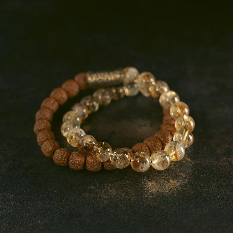 Personalised natural colour LCD double circle bracelet in citrine on a wrist.