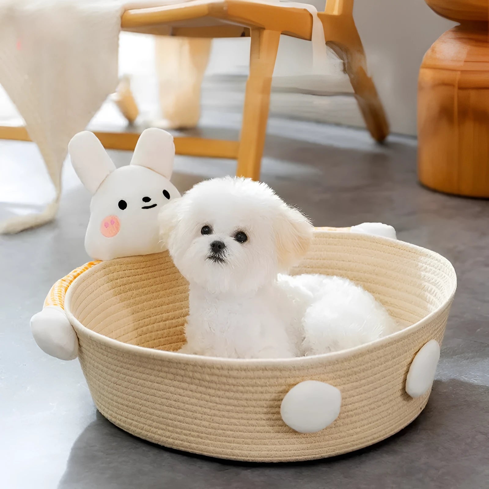 Woven cotton rope cat bed with scratching surface, shown with bear decoration in medium size.