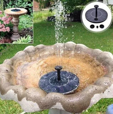 Black solar-powered garden water fountain pump with four different spray nozzle attachments