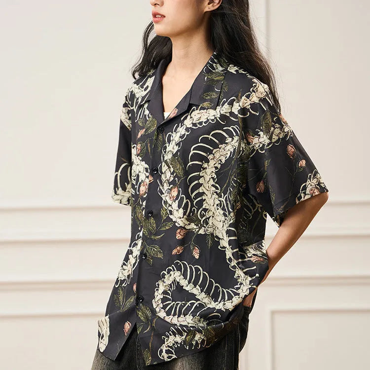 Original designer snake bone pattern printed on a short sleeve Cuban collar shirt in loose fit.